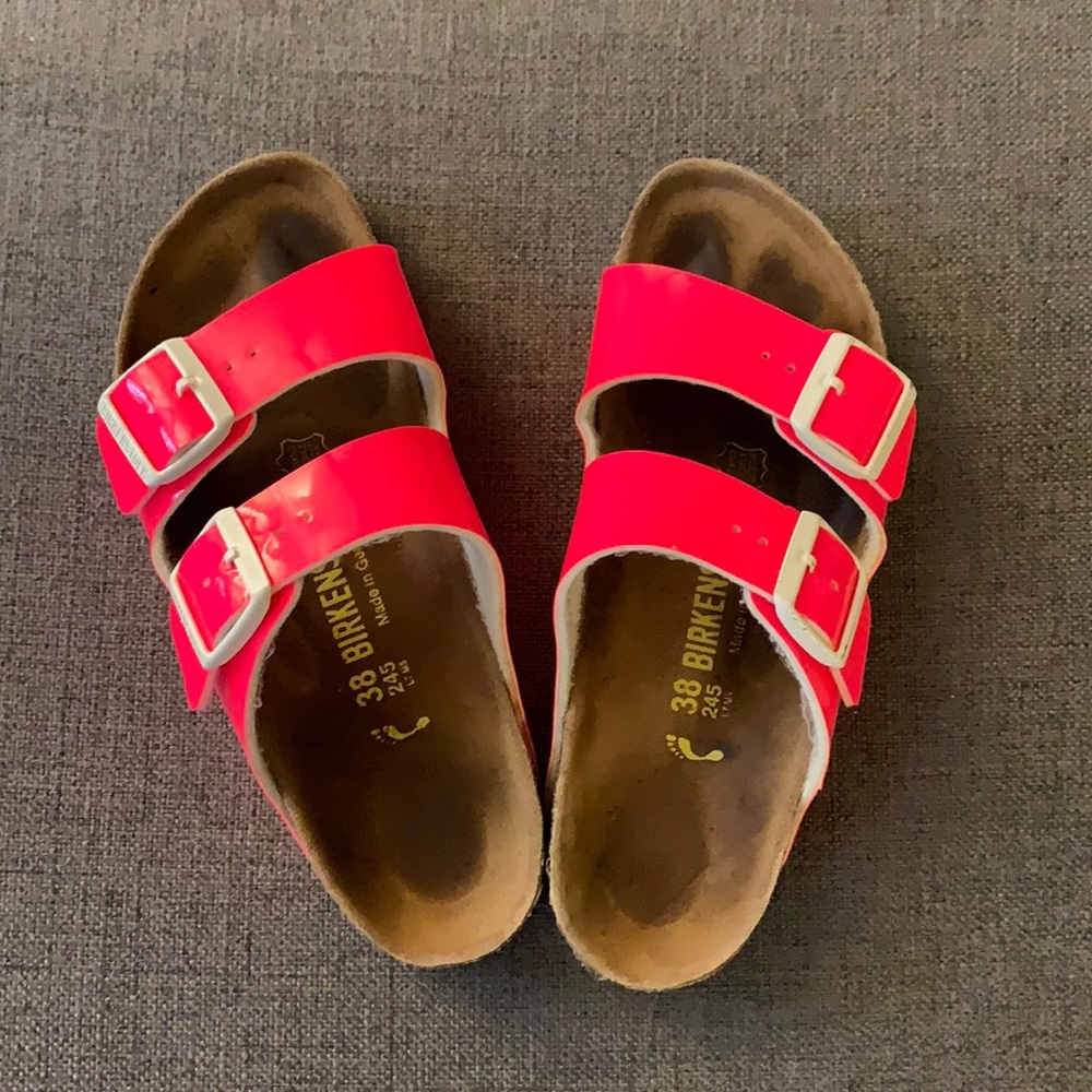 Birkenstock Arizona’s in hot pink patent.